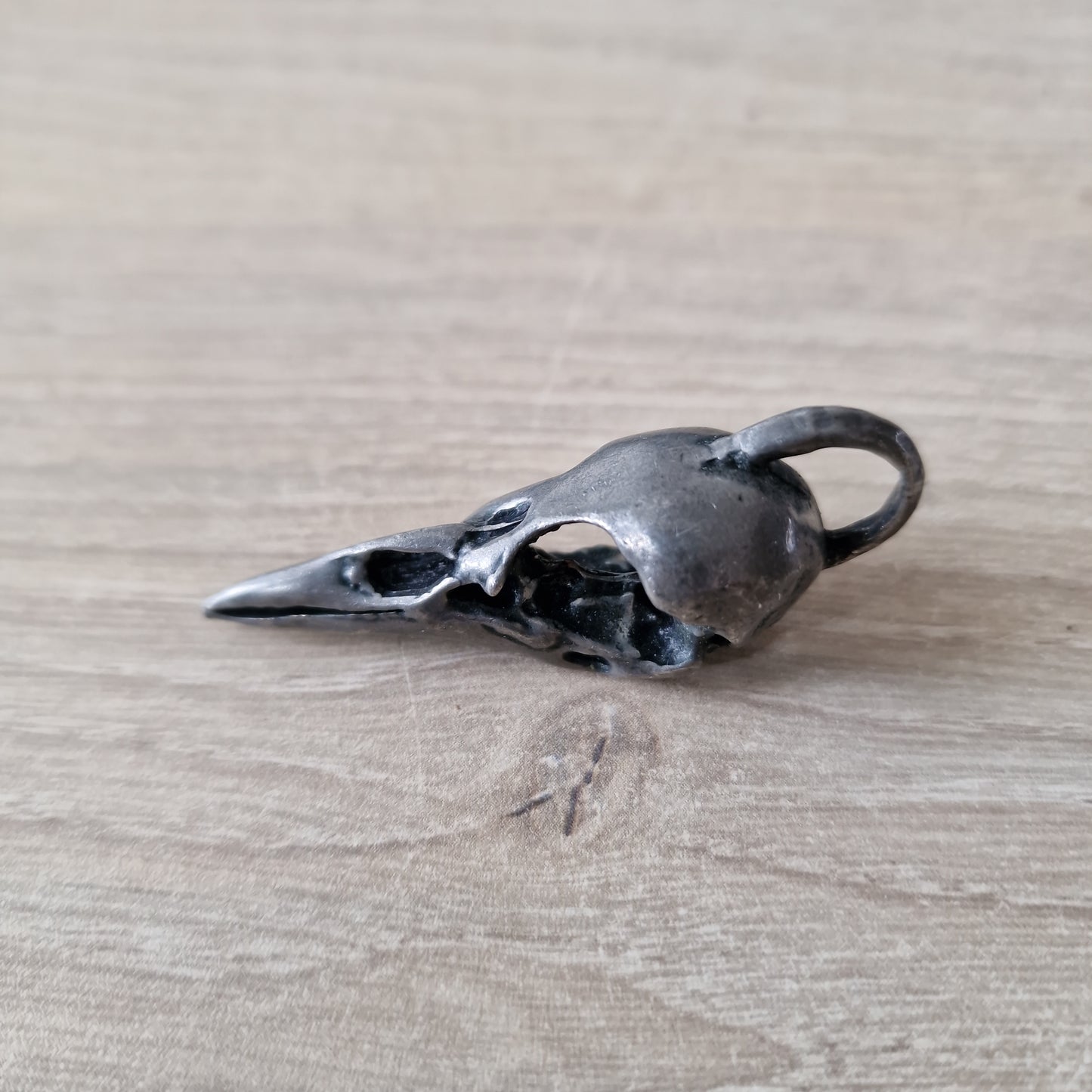 pendentif crâne d'oiseau