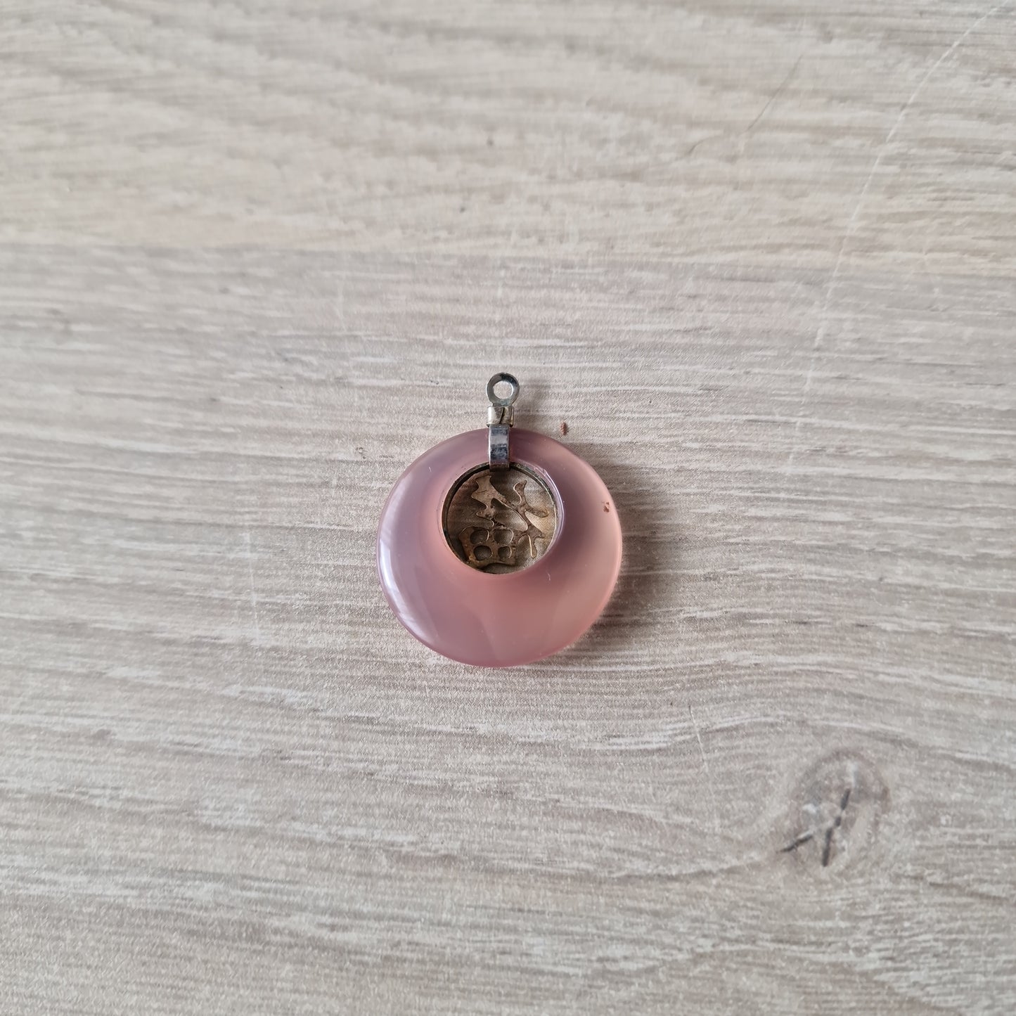 Chinese with rose quartz pendant