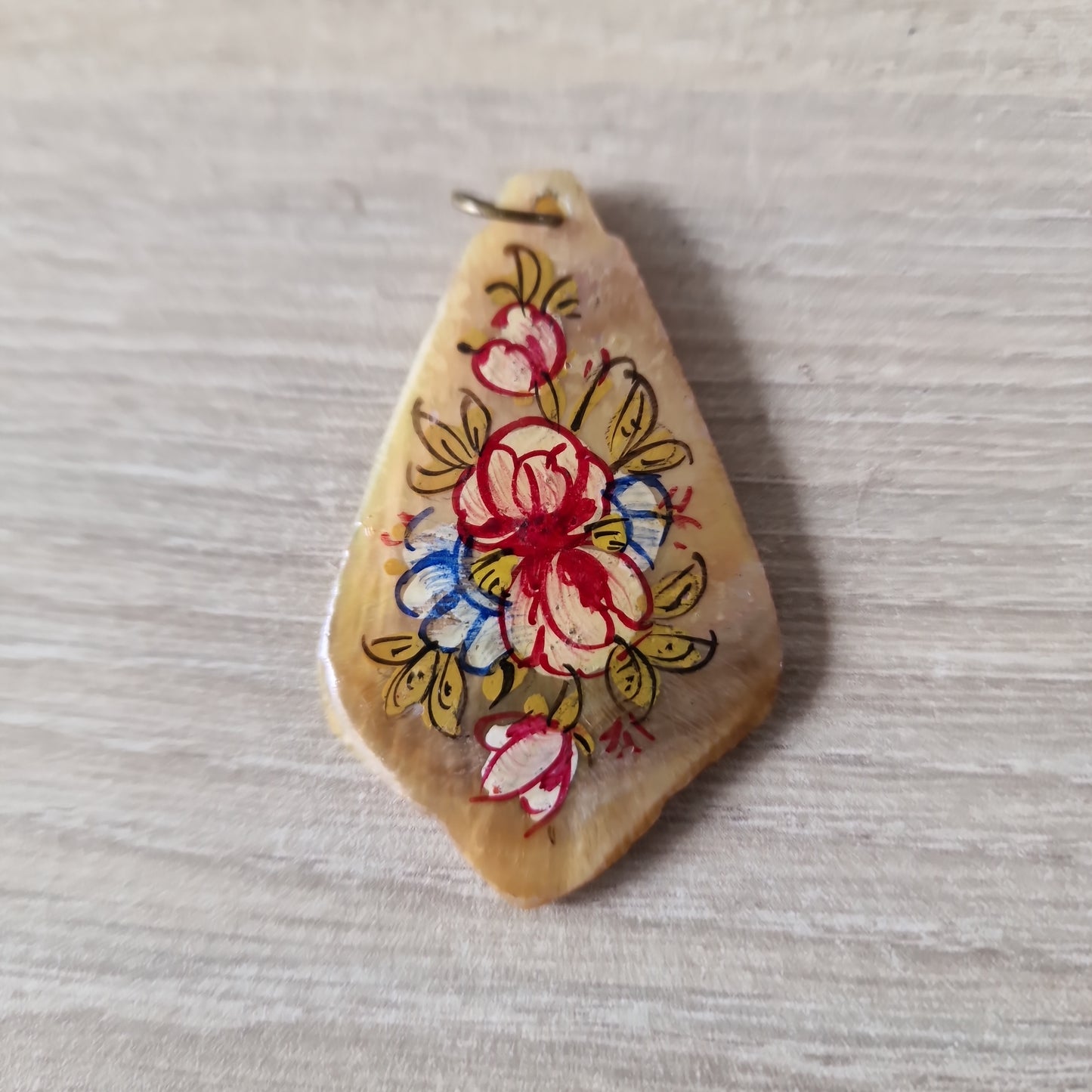 Painted shell pendant