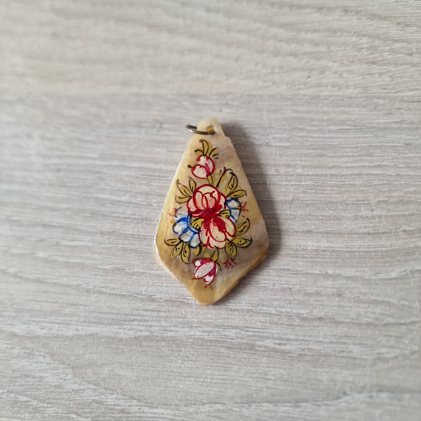 Painted shell pendant