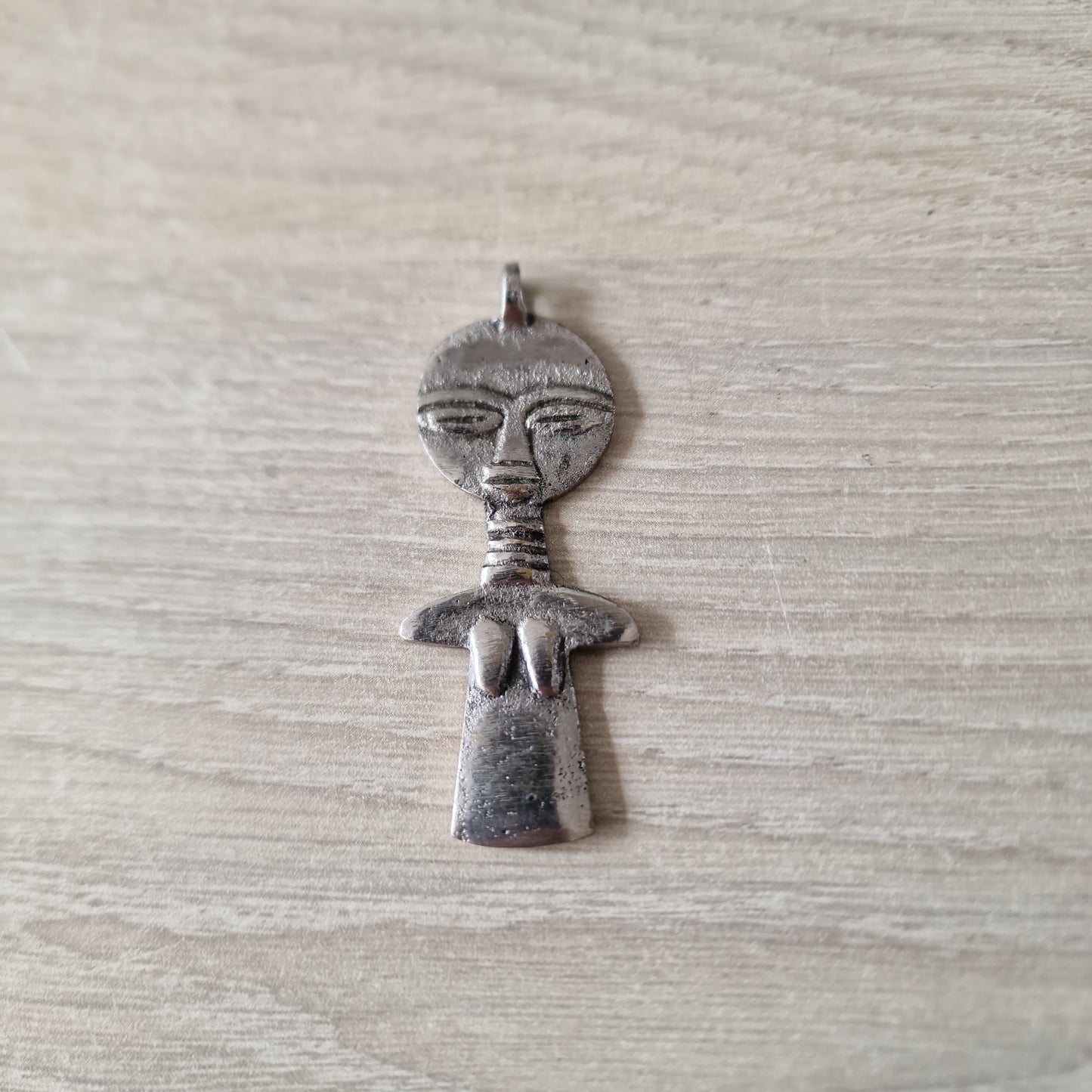 Pendentif de fertilité africain