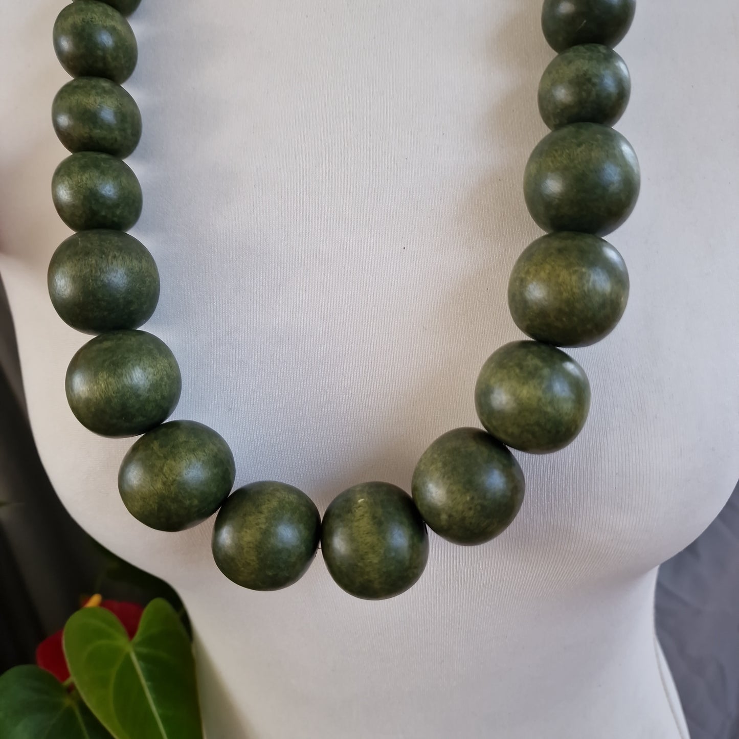 Green wooden bead necklace