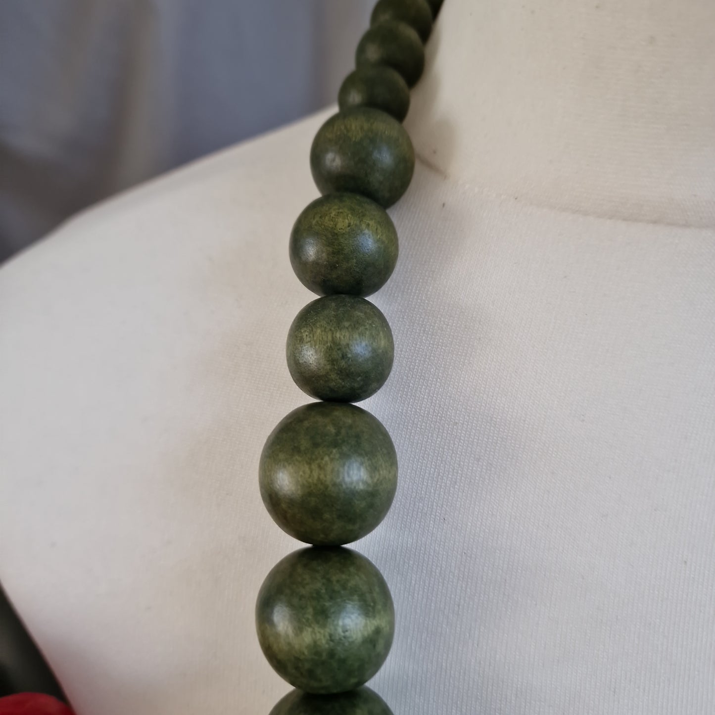 Green wooden bead necklace