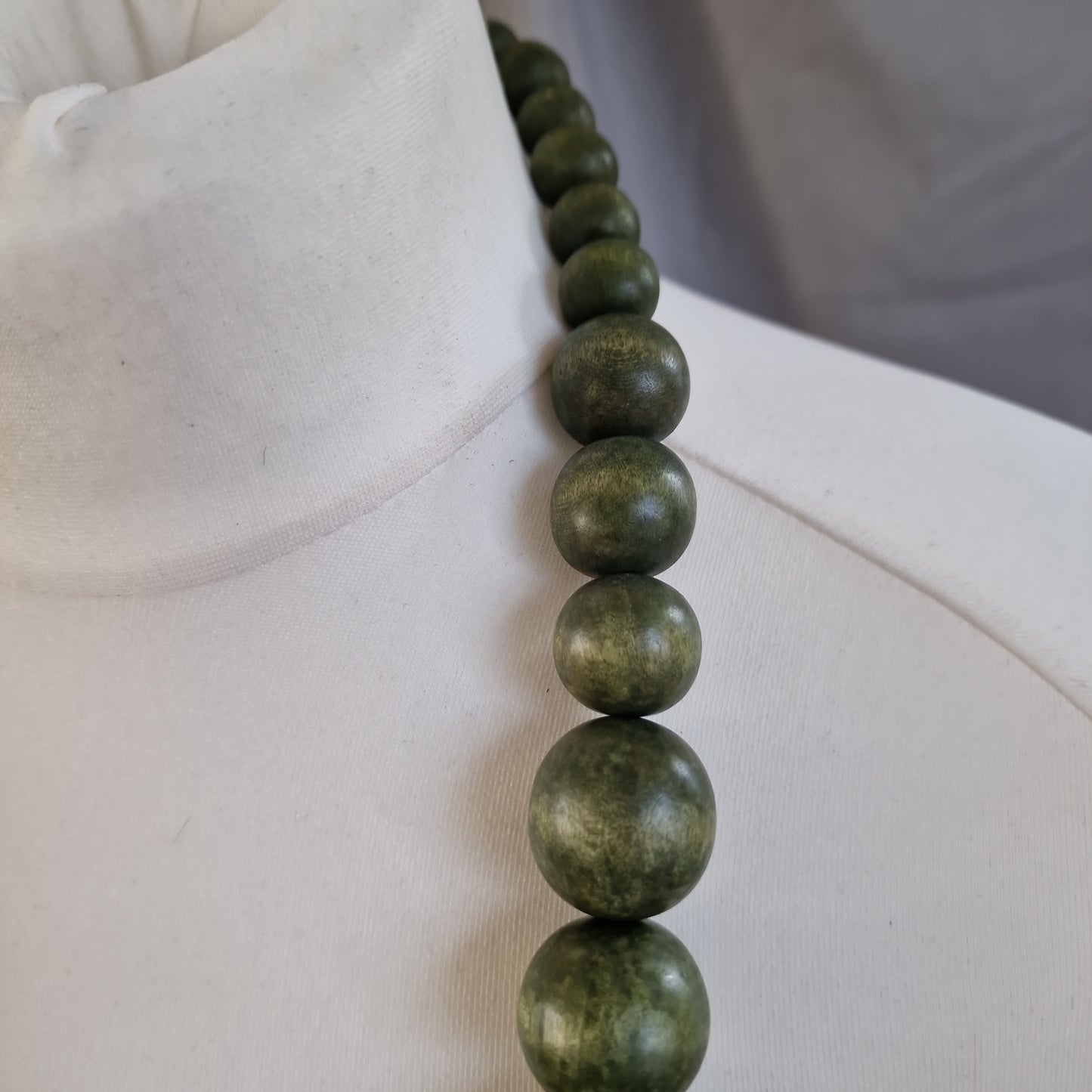 Green wooden bead necklace